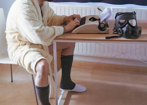 Man Bathrobe Working Home Typewriter Gas Mask Quarantine Concept — Stock Photo, Image