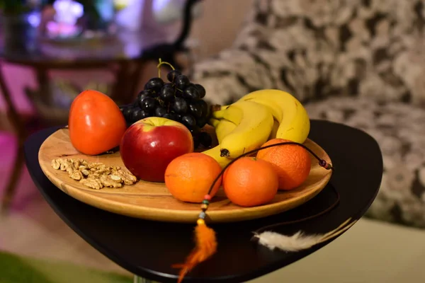 Bright fruit on a wooden platter