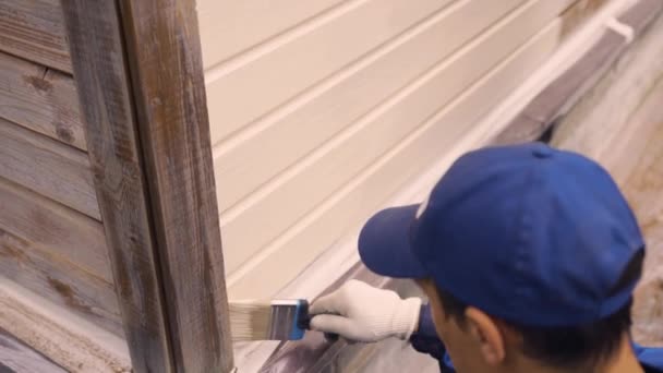 Målning ett hus målarhus — Stockvideo