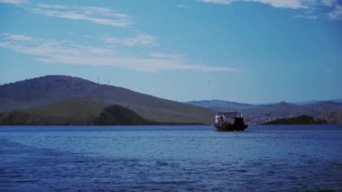 Ferries run between the mainland and the island Olkhon in Baikal. Ferry crossing to Olkhon Island.