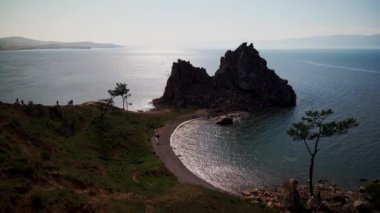 Shamanka Rock symbol of Baikal Lake near the village of Khuzhir at Olkhon Island, Russia. Nature landscape