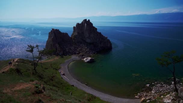Shamanka Rock symbol of Baikal Lake near the village of Khuzhir at Olkhon Island, Russia. Nature landscape — Stock Video