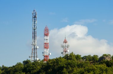 Telecommunication  towers with TV antennas clipart