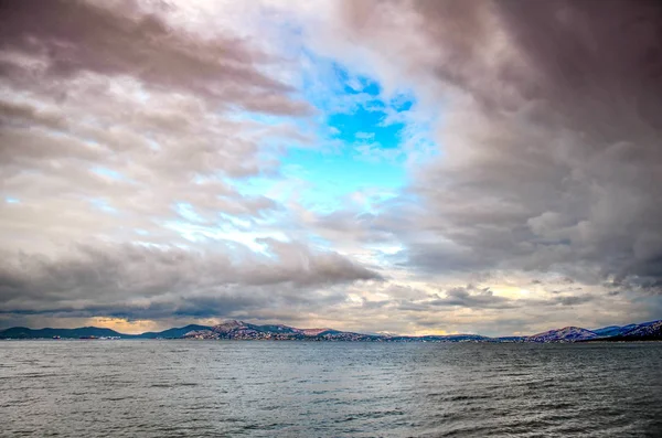 Dramatic sky over Pachi, A fishing village in Saronic gulf,Greece — Stock Photo, Image