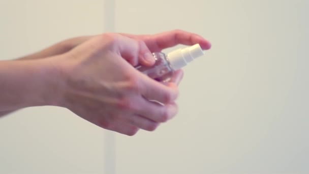 Concept of protecting the body from germs, viruses. Hand of woman that applying sanitizer dispenser — Stock Video