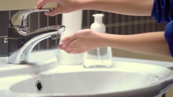 Concept of protecting the body from germs and viruses. Hand of child that applying lather and soap — Stock Video