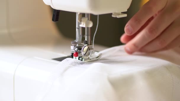 Seamstress at work. White mesh fabric. Close up view. — Stock Video