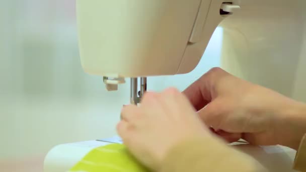 The process of hemming curtain edges from white mesh fabric. — Stock Video