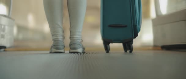 Woman Walking Escalator Walkway Suitcase Slow Motion Low Angle Close — Stock Video