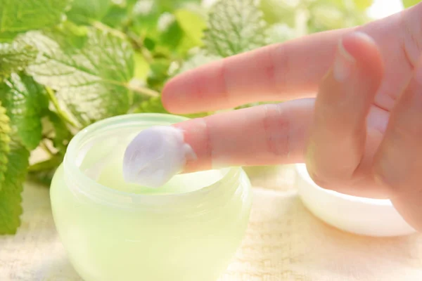 Skin care with moisturizing cream Stock Image