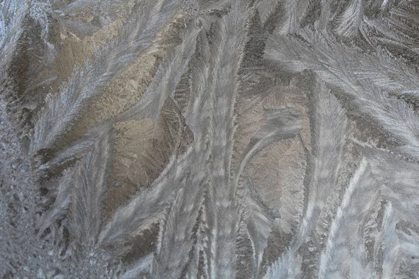 Russian winter. It is a frosty pattern on a window. Ice on a window.