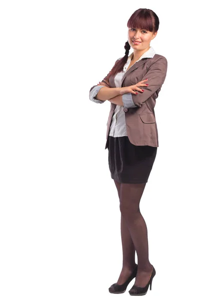 Volle Länge einer glücklichen Geschäftsfrau, die mit verschränkten Armen steht — Stockfoto