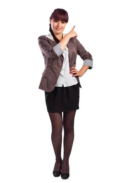 Full height pretty woman points the finger at something — Stock Photo, Image