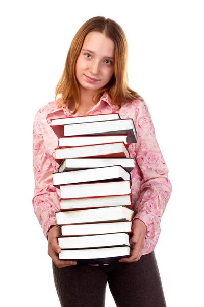 Chica sosteniendo una pila de libros de color . —  Fotos de Stock