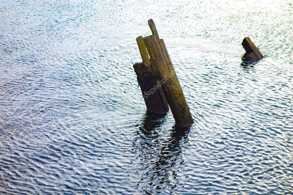 Old wood structures in the river.