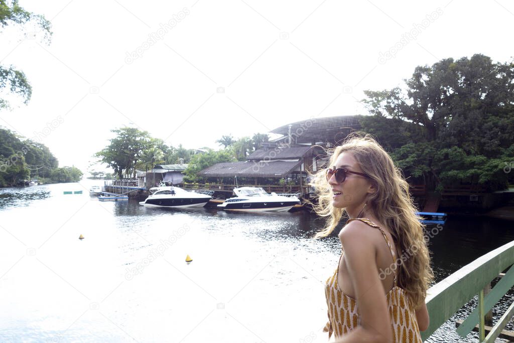 Beautiful brazilian girl at Barra do Una scenarios