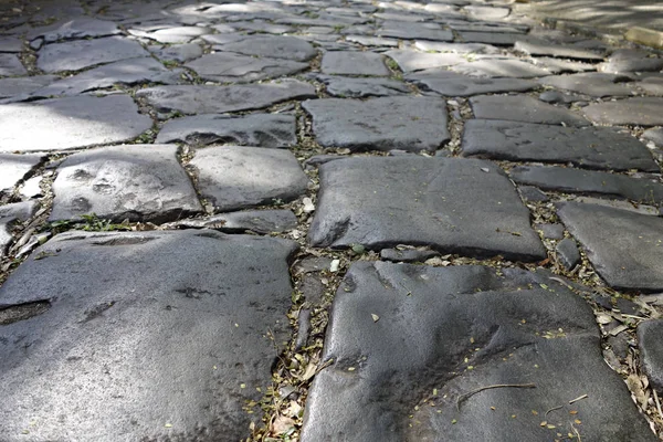 Old grey granite stone paving streets — Stock Photo, Image