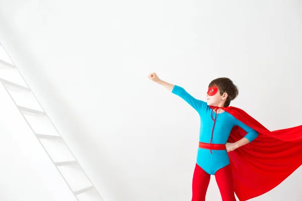 Kid superhero on white. — Stock Photo, Image