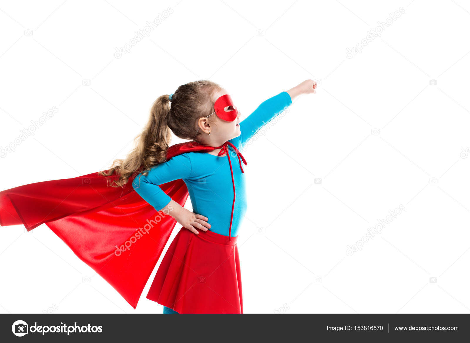 Little girl superhero in a red cloak and mask isolated on white background. — Stock Photo
