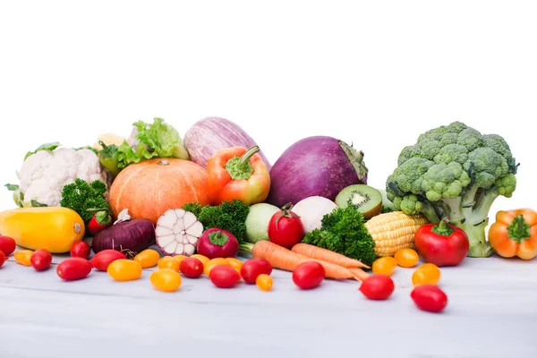 Fresh vegetables on wooden table. Isolated. — Stock Photo, Image