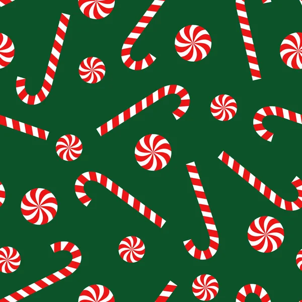 Candy cane a lízátko vánoční vzor bezešvé na zeleném pozadí. — Stockový vektor