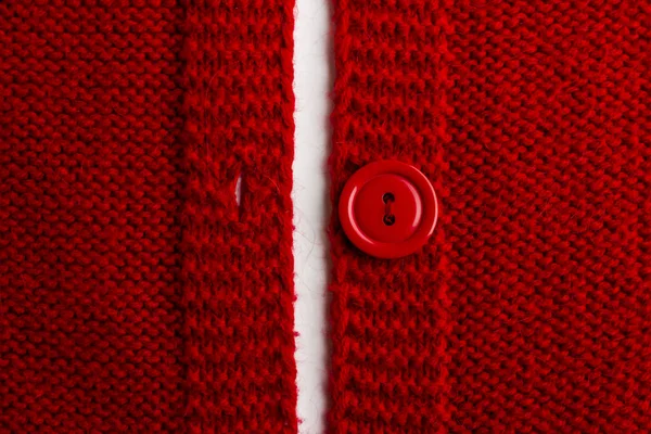 close-up shot of red sweater isolated on white