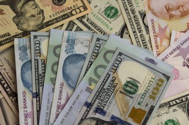close-up shot of dollar bills with euros and liras for background