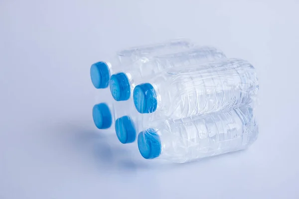 Close Shot Plastic Bottles Water Transparent Wrap White Surface — 스톡 사진