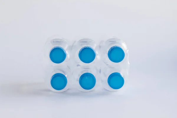 Close Shot Plastic Bottles Water White Surface — 스톡 사진