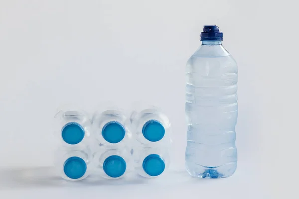 Close Shot Plastic Bottles Water White Surface — 스톡 사진