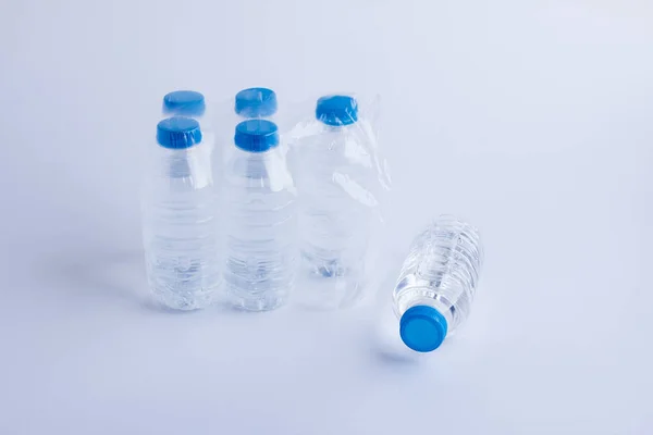 Close Shot Plastic Bottles Water Transparent Wrap White Surface — 스톡 사진