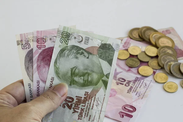 Lähikuva Turkkilaisista Liiraista Dollareista Valkoisella Pohjalla — kuvapankkivalokuva