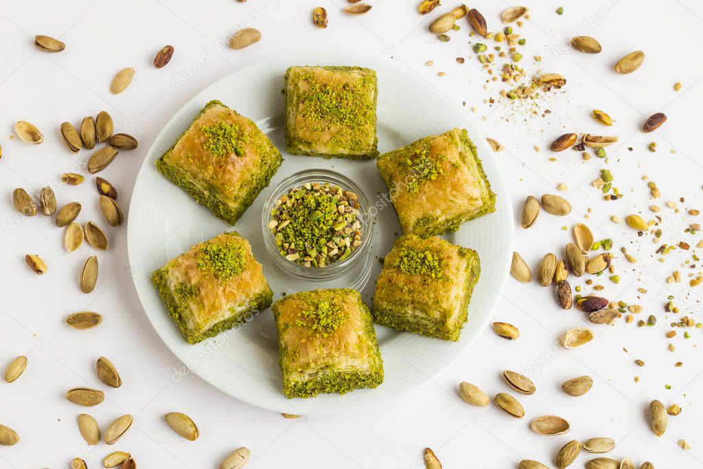 Close-up shot of delicious Turkish Sweet Dessert Baklava with pistachios on table.Top view.