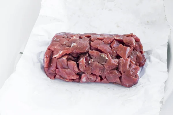 Uncooked Chopped Beef Meat White Paper Close Taken Sacrifice Feast — Stock Photo, Image