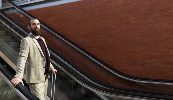 Businessman holding a handrail — Stock Photo, Image