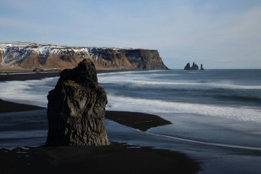 Reynisfjara beach in Area Iceland clipart