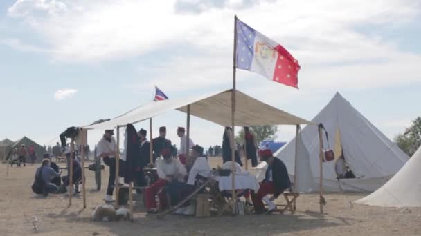 The flag of the French Empire. Military camp. Crimean War. Re-enacting of scenes — Stock Video