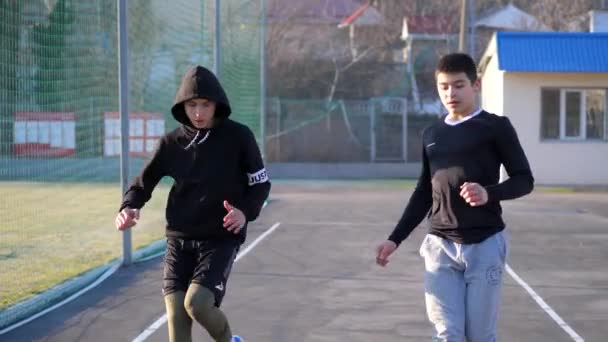 Warm - up of young athletes before training. morning fitness — Stock Video