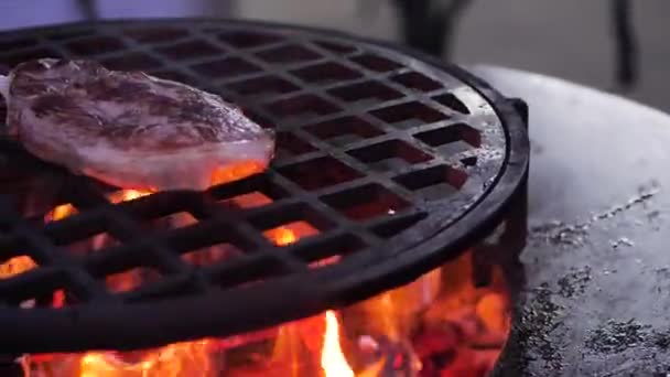 Close Up. Chef fries the meat on the grill. Frying fresh meat. slow motion — Stock Video