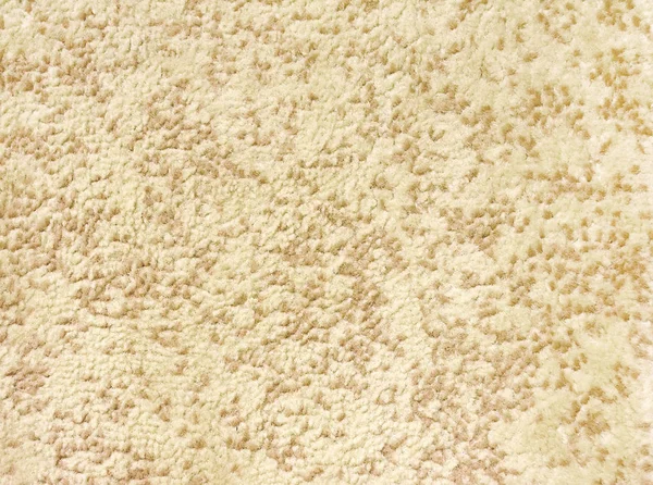Textura abstracta de una alfombra beige con pelo largo — Foto de Stock