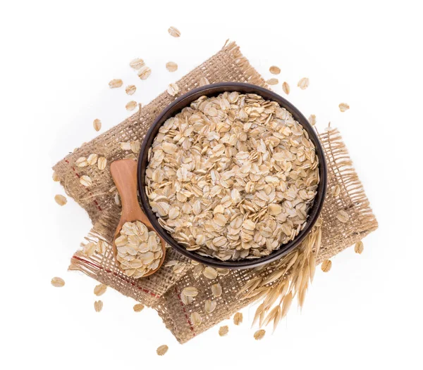 転がされたオートムギ、健康的な朝食穀物麦フレーク上分離 whi — ストック写真