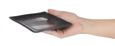 hand holding Rectangular Ceramic Tray isolated on a white backgr