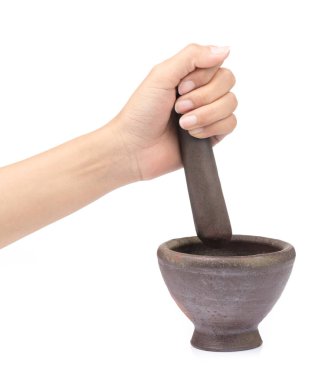 Mortar in a female hand isolated on white background