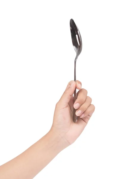 Hand holding stainless spoon isolated on white background — Stockfoto