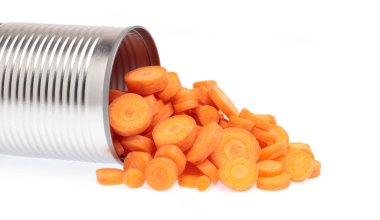 slice carrot on aluminium can isolated on white background.