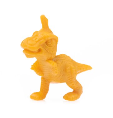 Beyaz arka planda izole edilmiş dinozor oyuncağı