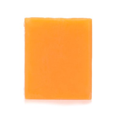 Natural handmade orange soap with herbs  isolated on white backg