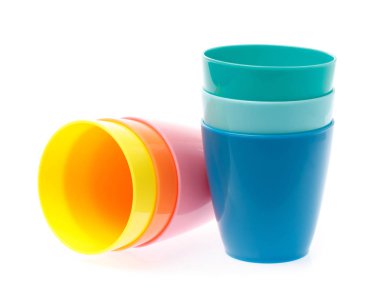 Empty colorful plastic glass isolated on white background