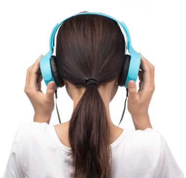 Young Woman Listen Music in A Blue Headphones Isolated on White 