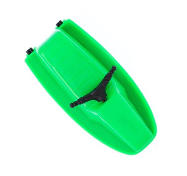 Green plastic ship toy isolated on white background